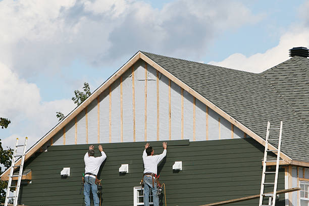 Professional Storm Damage Siding Repair technician working in Montgomery, PA